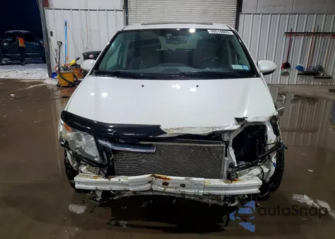 2015 Honda Odyssey Touring z USA, uszkodzony, nr VIN 5FNRL5H97FB059314